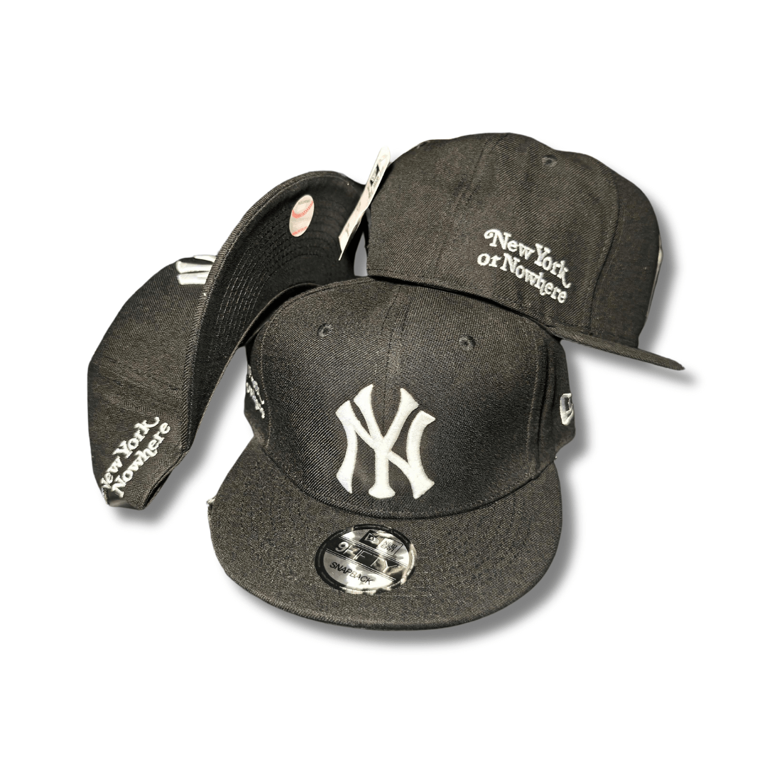 New York Yankees with White Embroidered Logo and "New York or Nowhere" Script Black Snapback Cap